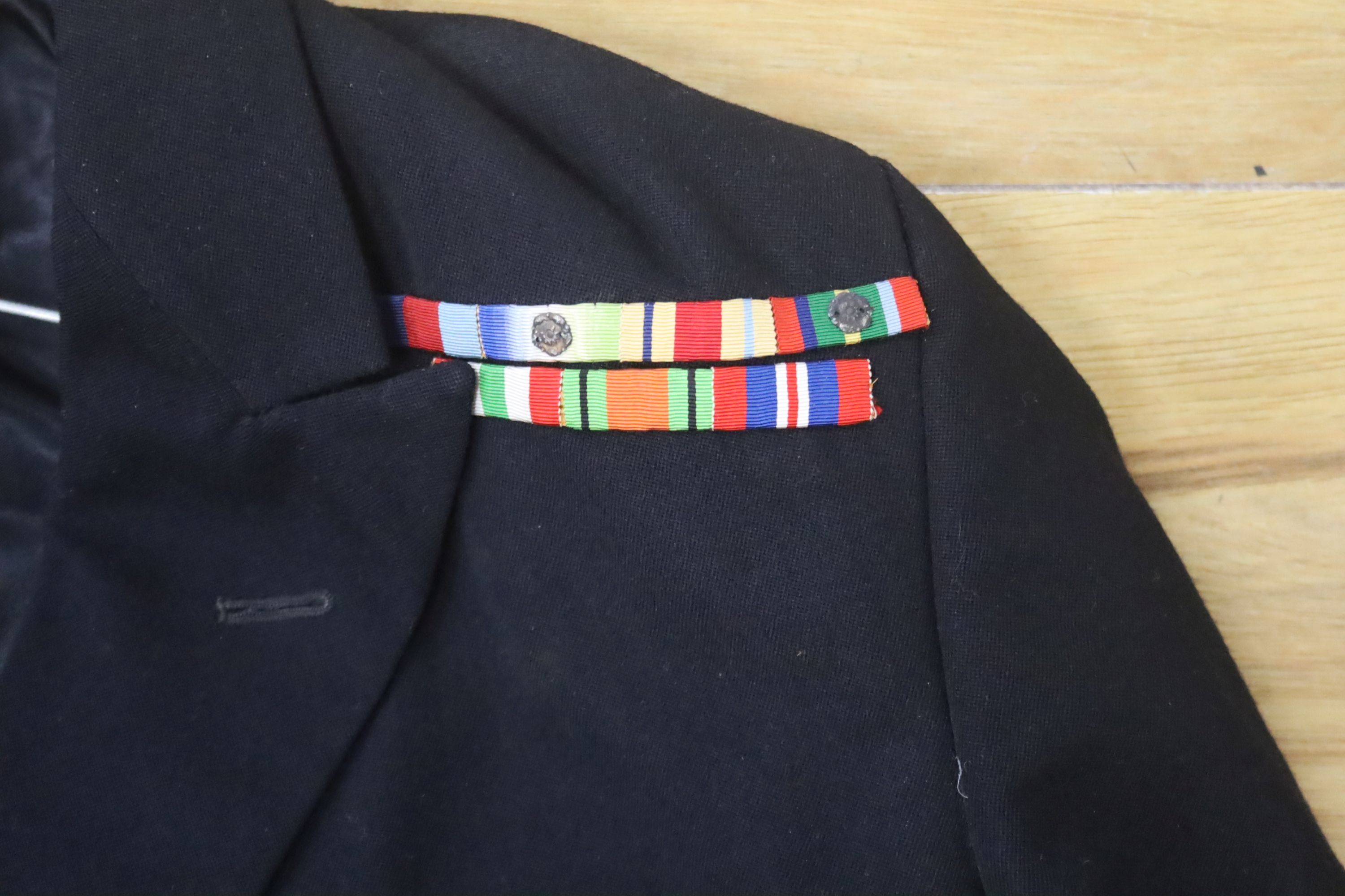 Two Royal Navy Captains jackets and associated trousers